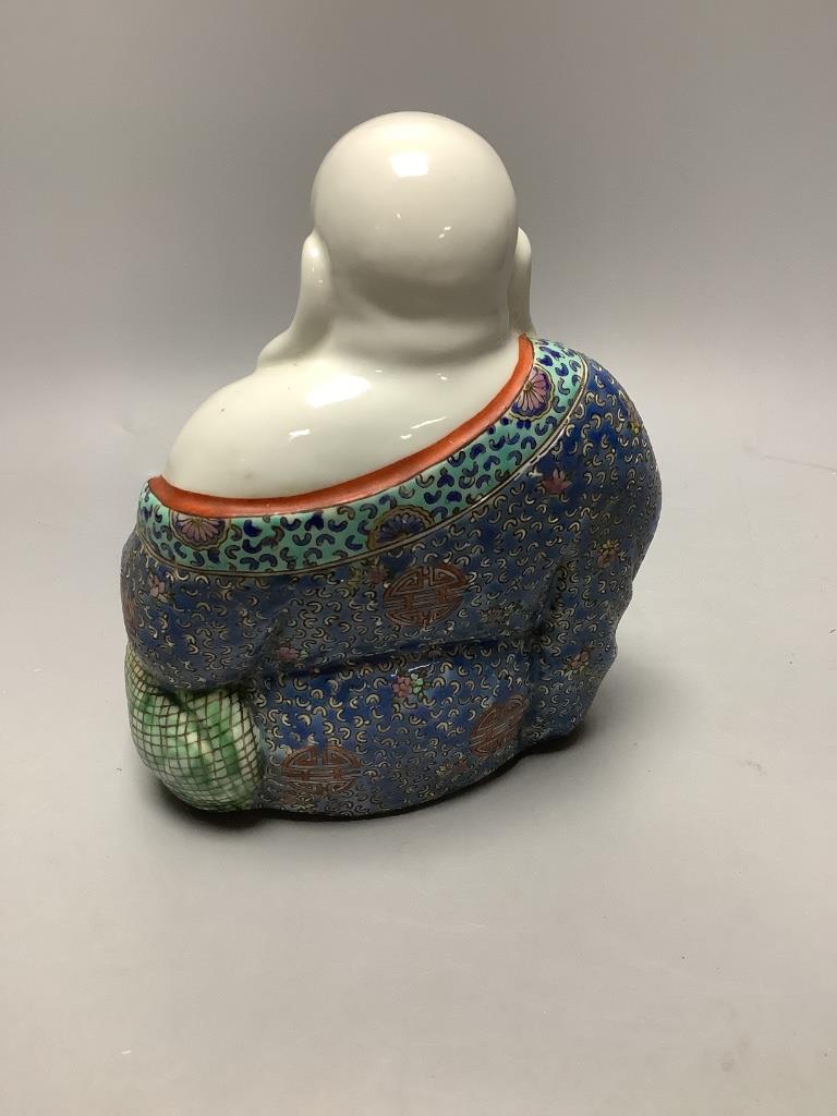 A Chinese famille rose figure of Budai, height 19cm